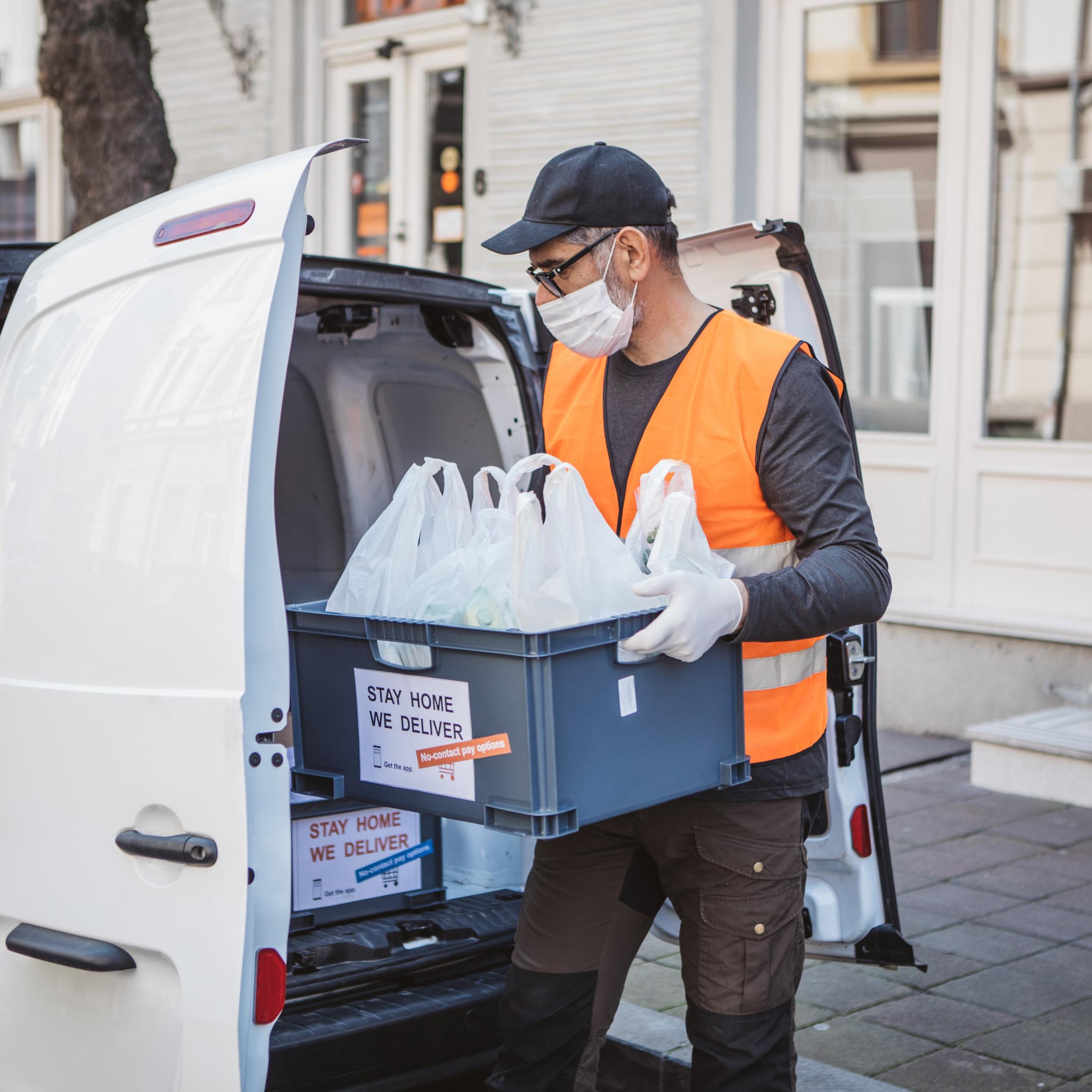 Man loading delivery van
